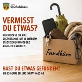 Eine Kiste voller Fundstücke mit dem Hinweis: Vermisst Du etwas? Hast du etwas gefunden?